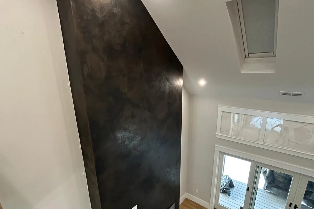 Burnished Venetian plaster wall in a finished living room