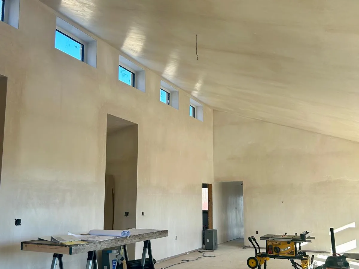 Large plastered commercial space with clerestory windows